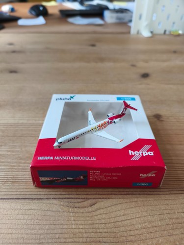 Herpa wings pluna bombardier - herpa,